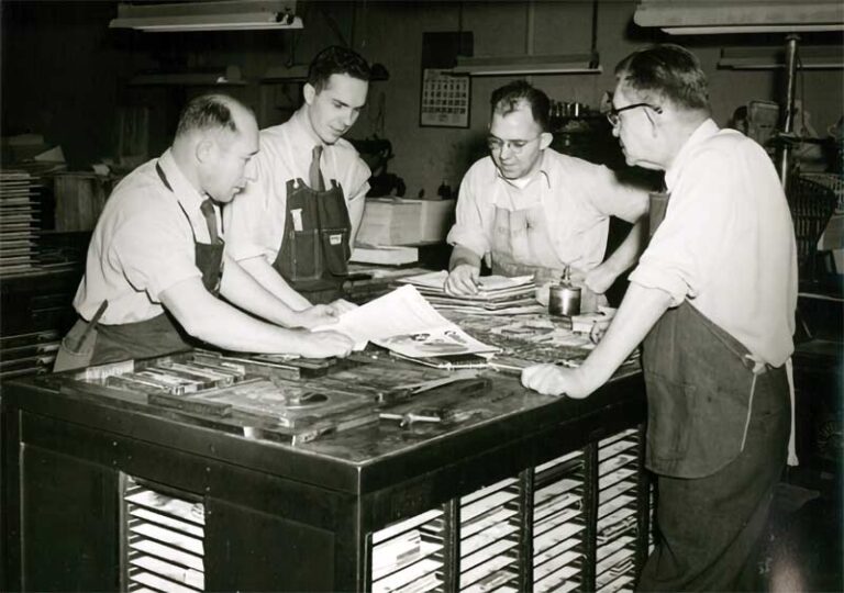 Historical photo of Castle Pierce Printing staff working.