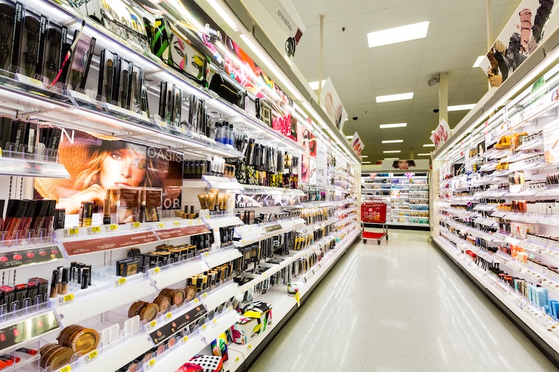 A beauty aisle at a retailer showing products with embellished blister cards
